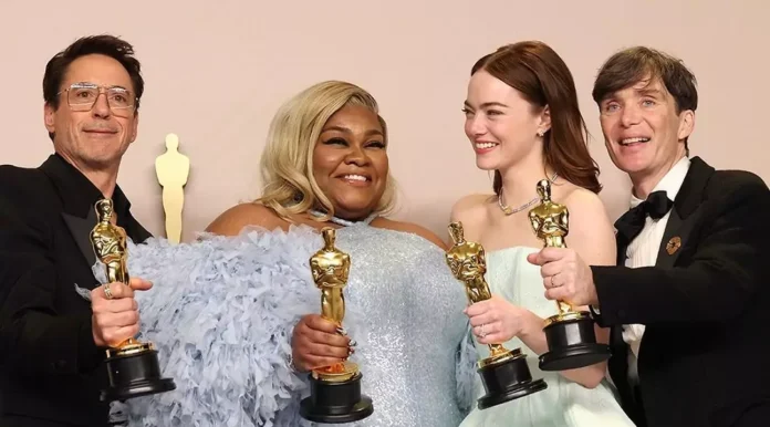 Oscar Winners holding their awards